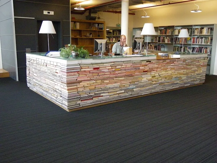 savvyhousekeeping library desk from recycled books