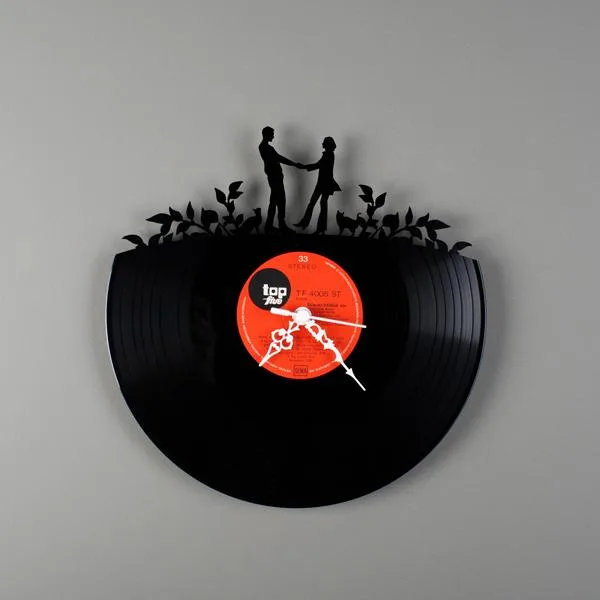savvyhousekeeping turning recycling old vinyle records to wall clocks what to do with