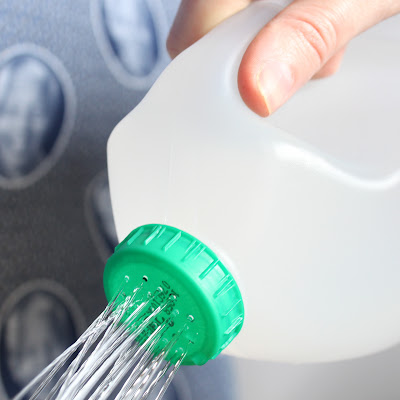savvyhousekeeping 10 ways to recycle a milk jug watering can